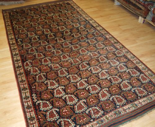 Antique Persian Kurdish or Afshar Rug of Large Size with All Over Boteh Design, Circa 1900