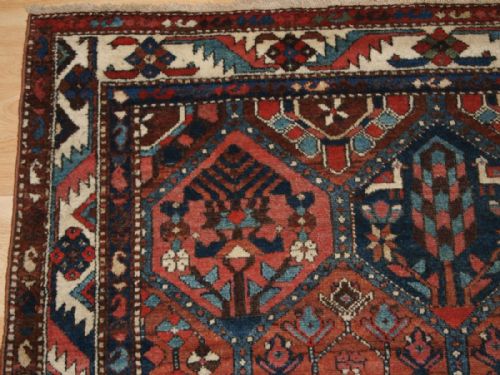 fig 1. ANTIQUE CENTRAL PERSIAN BAKHTIARI RUG, GARDEN DESIGN WITH TREES AND BIRDS, CIRCA 1900/20.