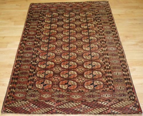 Antique Tekke Turkmen Rug, Fine Weave, Soft Wool, Browns and Pinks, Small Size, Circa 1900.