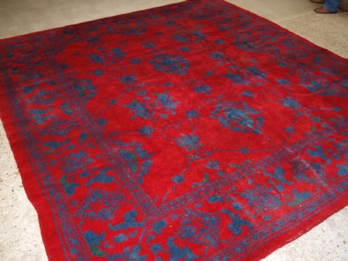 Antique Irish Donegal Carpet in Turkish Oushak Design, Red and Blue, Square Shape, Circa 1900.