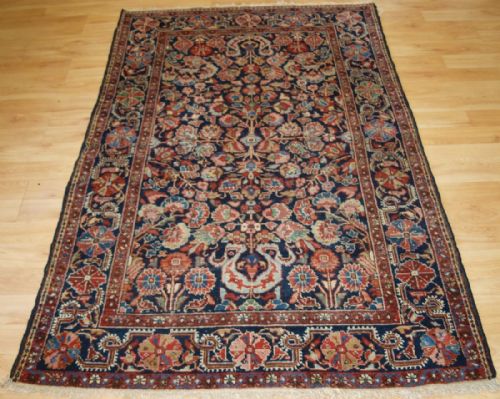Antique North West Persian Village Rug, Greater Hamadan, Floral Design with Cloud Band, Circa 1900.