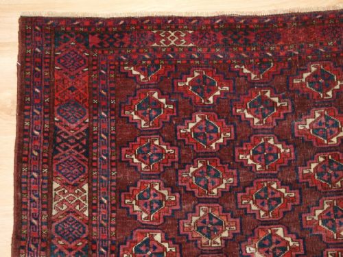 fig 1. ANTIQUE ERSARI TURKMEN CHUVAL, WITH UNUSUAL OFF SET GUL DESIGN, CIRCA 1900.