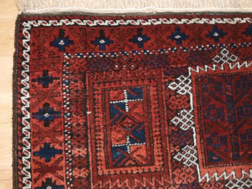 fig 1. ANTIQUE BALUCH RUG WITH TRADITIONAL TIMURI OR YAQUB KHANI TRIBAL DESIGN, CIRCA 1900.