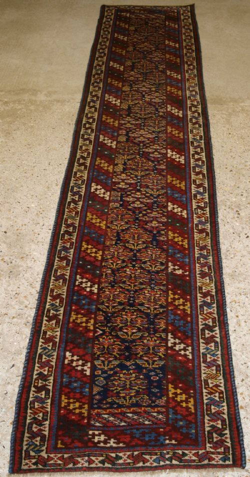 Antique South Caucasian Kurdish Runner of Very Narrow Width, Shrub Design, Circa 1900.