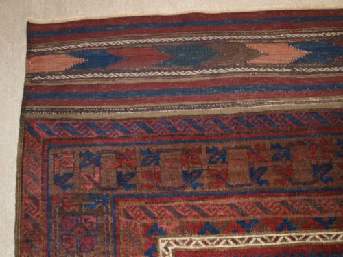 fig 1. ANTIQUE WESTERN AFGHAN BALUCH CARPET, SHRUB DESIGN, LONG KILIM ENDS, CIRCA 1870.