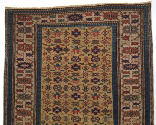 fig 1. ANTIQUE CAUCASIAN KUBA RUG WITH YELLOW GROUND, VERY FINE WEAVE, CIRCA 1880.