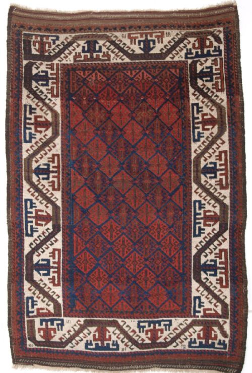 Antique Baluch Rug of Small Size, with Ivory Boat Border and Lattice Design, Circa 1880.