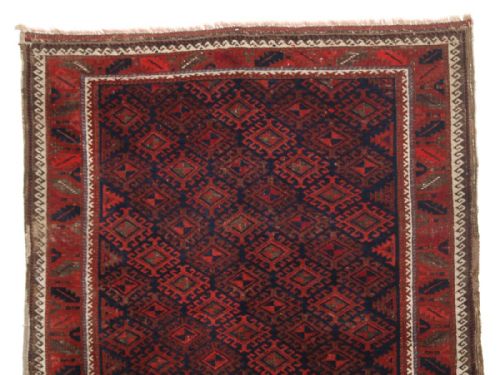 fig 1. ANTIQUE BALUCH RUG OF LARGER THAN NORMAL SIZE, LATCH HOOK MEDALLION LATTICE DESIGN, CIRCA 1880.