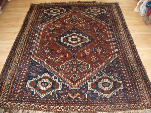 Old South West Persian Shiraz Region Rug with Tribal Design, Good Condition, Circa 1920.