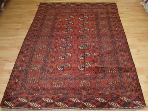 Old Afghan Rug of Traditional Turkmen Design, Soft Red Colour, Circa 1920.