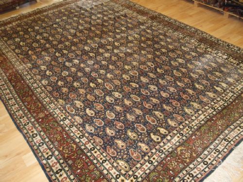 Old Turkish Hereke Carpet of All Over Boteh Design, Signed 'Hereke', Circa 1920/30.