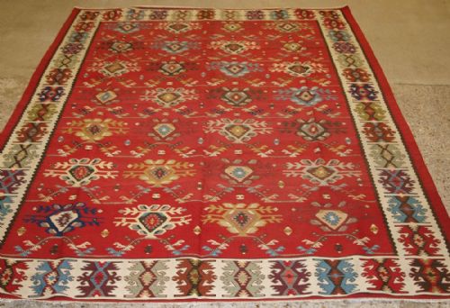 Old Turkish Sarkoy Kilim Rug, Unusual Design on Soft Red Ground, Circa 1920.