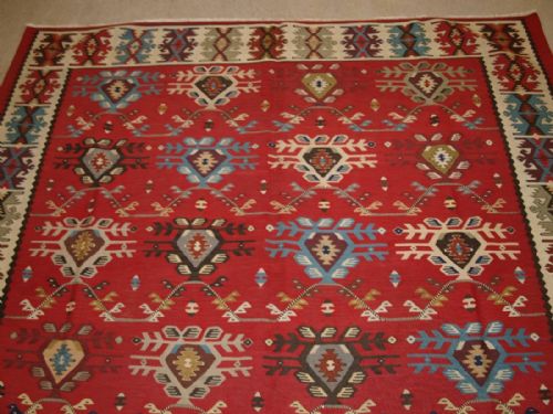 fig 1. OLD TURKISH SARKOY KILIM RUG, UNUSUAL DESIGN ON SOFT RED GROUND, CIRCA 1920.