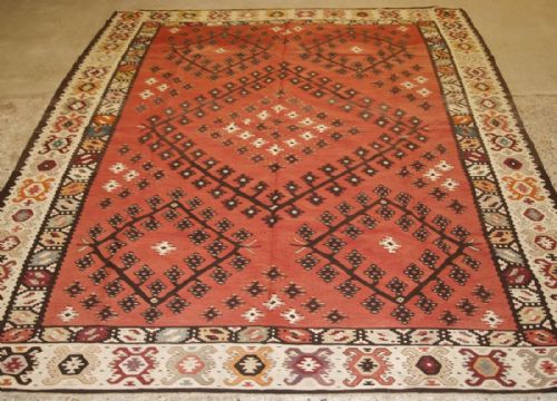 Old Turkish Sarkoy Kilim Rug, Traditional Design on Soft Red Ground, Circa 1920.