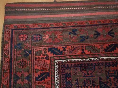 fig 1. ANTIQUE TIMURI BALUCH MAIN CARPET, CLASSIC DESIGN, CORRODED BROWNS, CIRCA 1900.