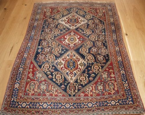 Antique South West Persian Tribal Qashqai Rug, Trible Medallion Design, Circa 1900.