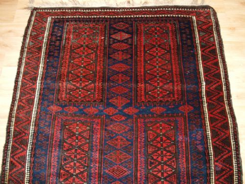 fig 1. ANTIQUE AFGHAN BALUCH RUG WITH TIMURI DESIGN, CIRCA 1900.