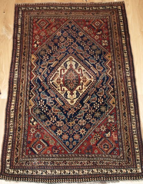 Antique South West Persian Qashqai Rug, Small Size with Animals, Circa 1900.