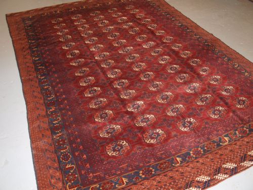 Old Afghan Village Carpet with Beshir Turkmen Border Design, Circa 1920.