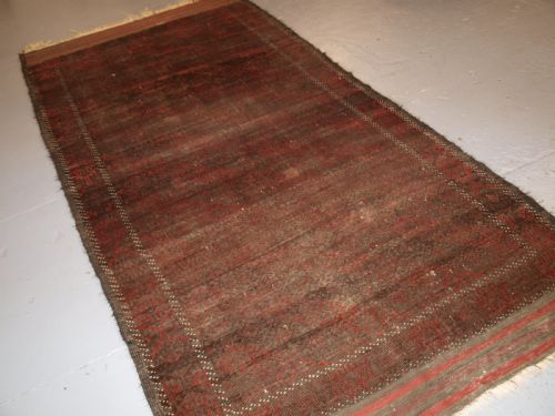 Antique Afghan Baluch Rug, Heavy Wear, Good Lived with Look, Circa 1900.