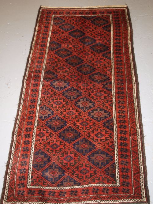 Antique Baluch Rug with Lattice Design, Star Border, Circa 1900.