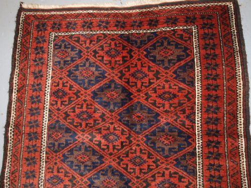 fig 1. ANTIQUE BALUCH RUG WITH LATTICE DESIGN, STAR BORDER, CIRCA 1900.