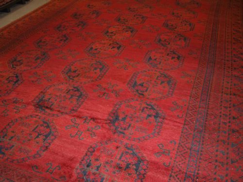 fig 1. ANTIQUE AFGHAN ERSARI CARPET OF VERY LARGE SIZE WITH SUPERB ROSE MADDER COLOUR, CIRCA 1900.