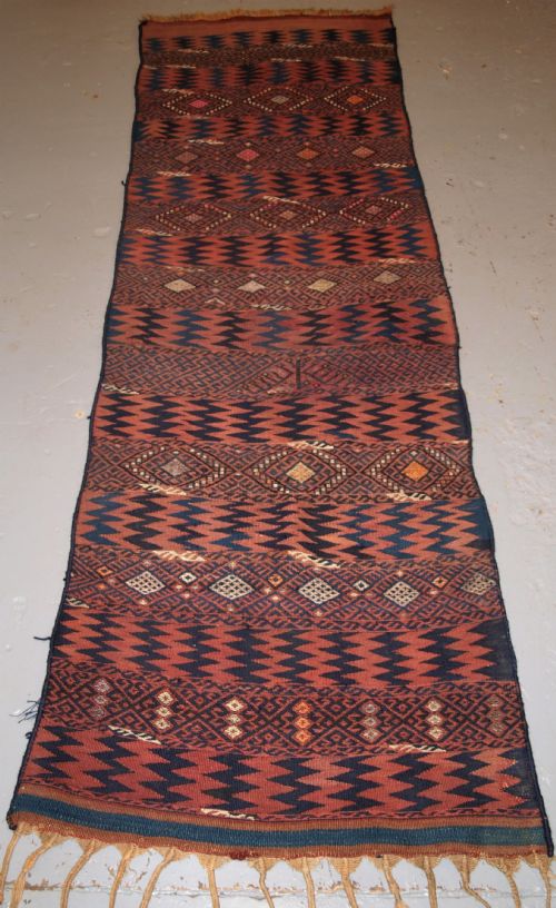 Old Eastern Turkish Kilim Runner by the Herki Tribe, Weft Work Decoration, Circa 1920.