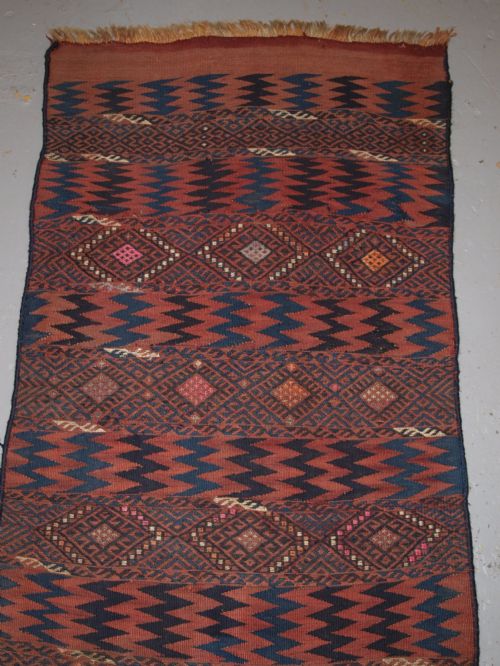 fig 1. OLD EASTERN TURKISH KILIM RUNNER BY THE HERKI TRIBE, WEFT WORK DECORATION, CIRCA 1920.