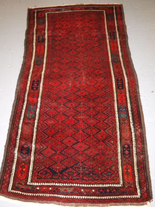 Antique Baluch Rug with Fine Diamond Lattice Design, Interesting Border, Circa 1900.