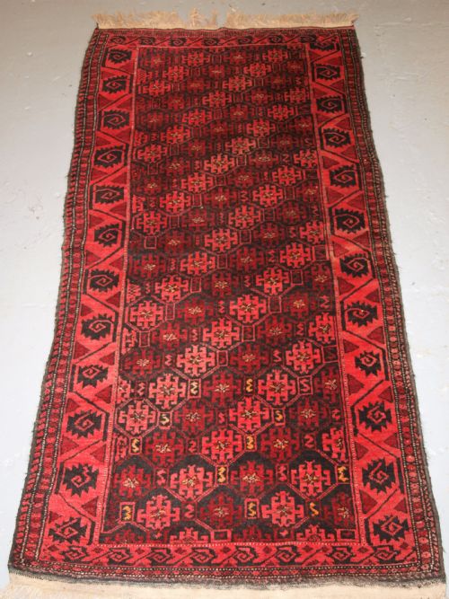 Old Afghan Rug with Repeat Design, Curl Leaf Border, Rustic Charm, Circa 1920.