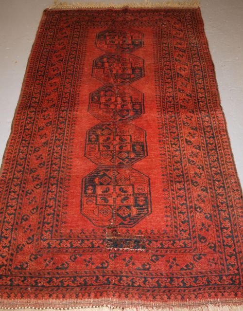 Old North Afghan Village Rug with Superb Colour, Low Price Due to Old Repair, Circa 1920.