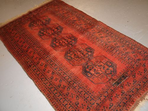 fig 1. OLD NORTH AFGHAN VILLAGE RUG WITH SUPERB COLOUR, LOW PRICE DUE TO OLD REPAIR, CIRCA 1920.