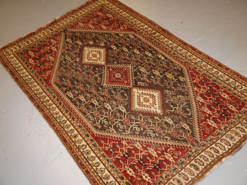fig 1. ANTIQUE SOUTH WEST PERSIAN TRIBAL QASHQAI RUG, TRIPLE MEDALLION, CIRCA 1880.