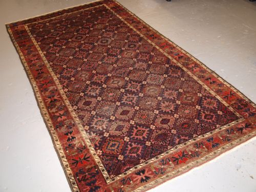 Antique Baluch Rug with Snow Flake Lattice Design, Western Afghanistan, Late 19th Century.
