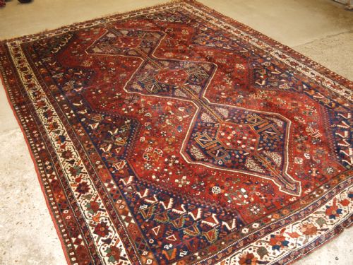 Old South West Persian Shiraz Region Triple Medallion Carpet with Tribal Design, Great Condition, Circa 1920.