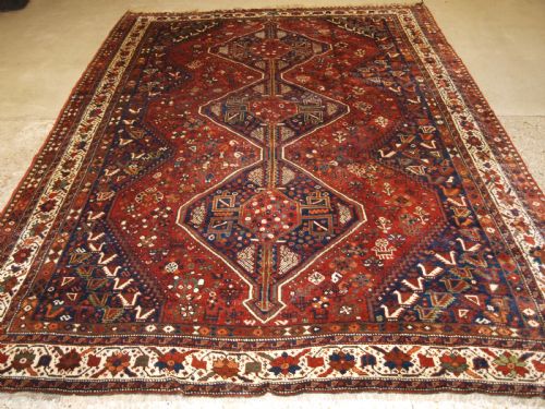 fig 1. OLD SOUTH WEST PERSIAN SHIRAZ REGION TRIPLE MEDALLION CARPET WITH TRIBAL DESIGN, GREAT CONDITION, CIRCA 1920.