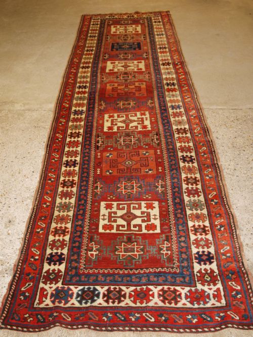 Antique North Persian Kurdish Runner with Boxed Medallion Design, Circa 1900.