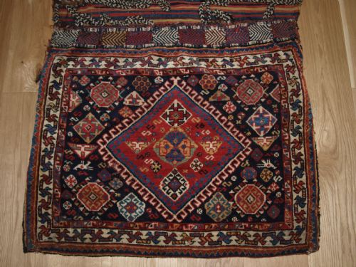 fig 1. ANTIQUE COMPLETE QASHQAI KHORJIN SADDLE BAGS OF LARGE SIZE WITH PLAIN WEAVE BACK, CIRCA 1900.