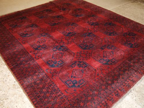 Old Afghan Village Carpet, Deep Red, Almost Square Size, Circa 1920.