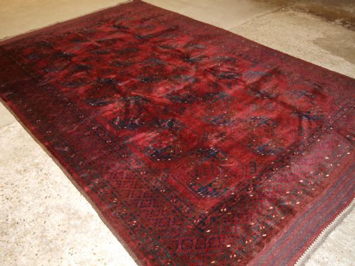 Old Red Afghan Village Carpet, Outstanding Condition, Deep Red Colour, Circa 1920.