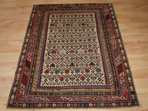 Antique Caucasian Daghestan Rug with Ivory Ground Floral Lattice, Superb, Circa 1880.