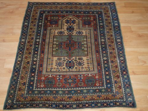 Antique Caucasian Derbent Prayer Rug in Classic Kazak Prayer Design, Circa 1900.