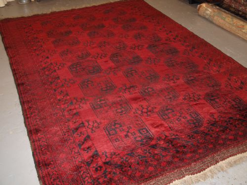 Old Red Afghan Village Carpet, Slight Tension Problem Hence the Low Price, Circa 1920.