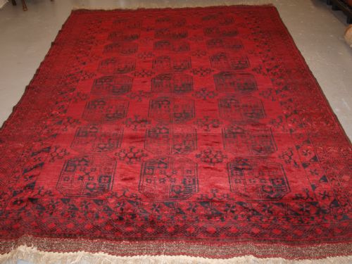 fig 1. OLD RED AFGHAN VILLAGE CARPET, SLIGHT TENSION PROBLEM HENCE THE LOW PRICE, CIRCA 1920.