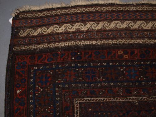 fig 1. ANTIQUE TIMURI BALUCH MAIN CARPET, OUTSTANDING COLOUR, EX WISDOM COLLECTION. 2ND HALF 19TH CENTURY.