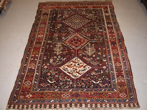 Antique South West Persian Tribal Khamseh Rug, Triple Medallion, Circa 1900.