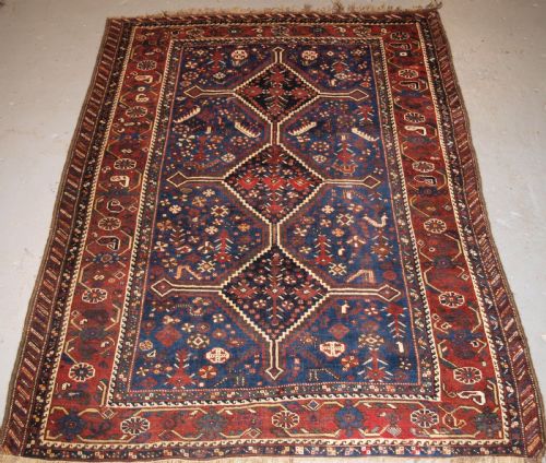 Antique Tribal Khamseh Rug, Triple Linked Medallion, Circa 1900.
