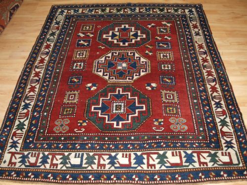 Antique Caucasian Kazak Rug with Memlinc Guls, Superb Border, Late 19th Century.