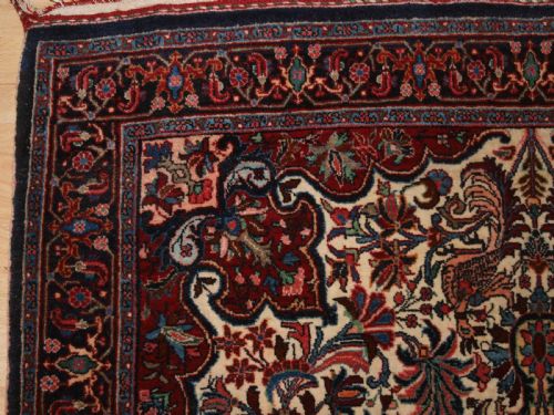 fig 1. OLD PERSIAN BIJAR RUG, IVORY GROUND WITH FLORAL DESIGN, CIRCA 1920/30.